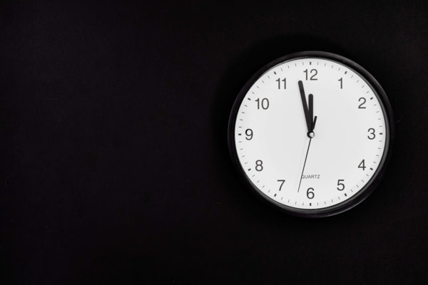 Photo of Clock On A Black Background