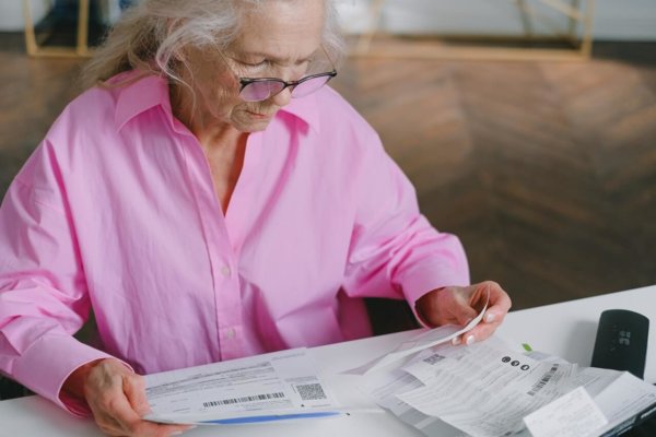 woman looking at papers